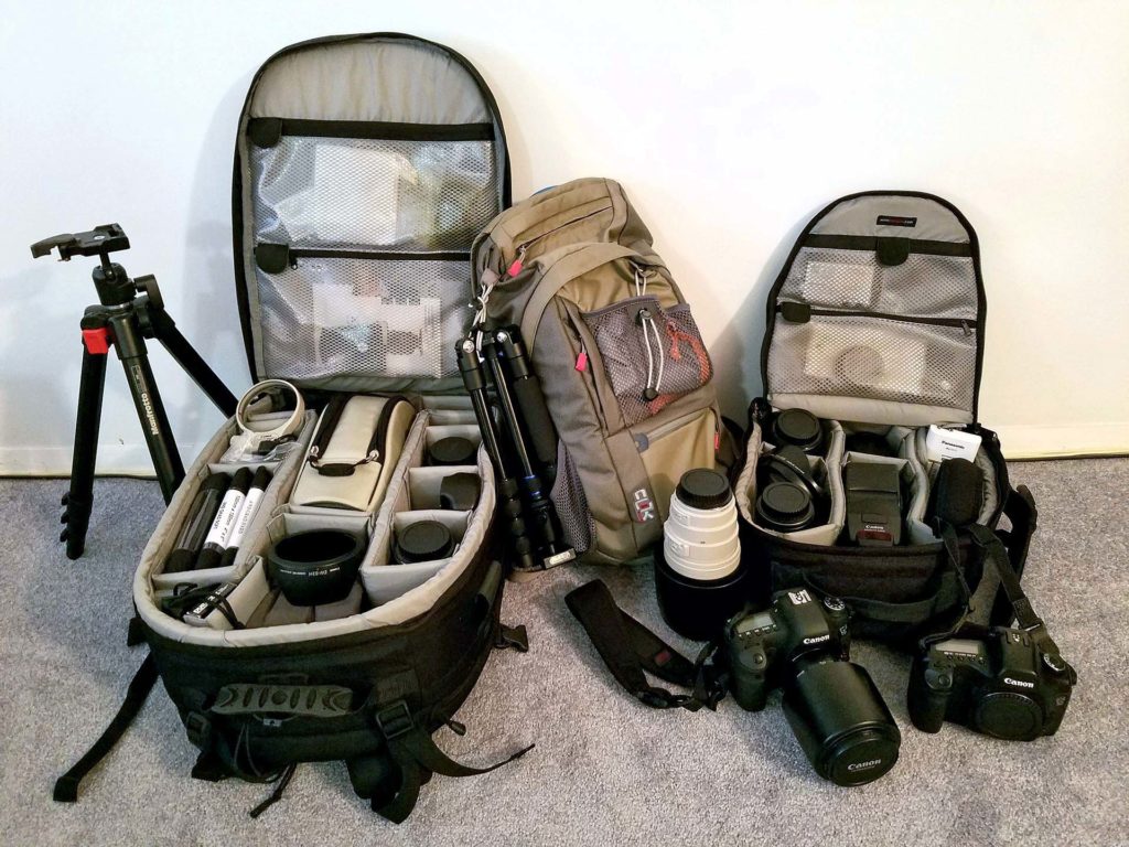 a mess of photography equipment