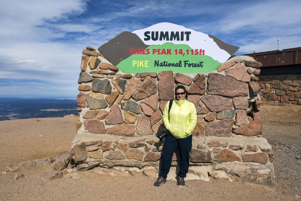 Lori at the 14,115 ft summit of Pikes Peak.