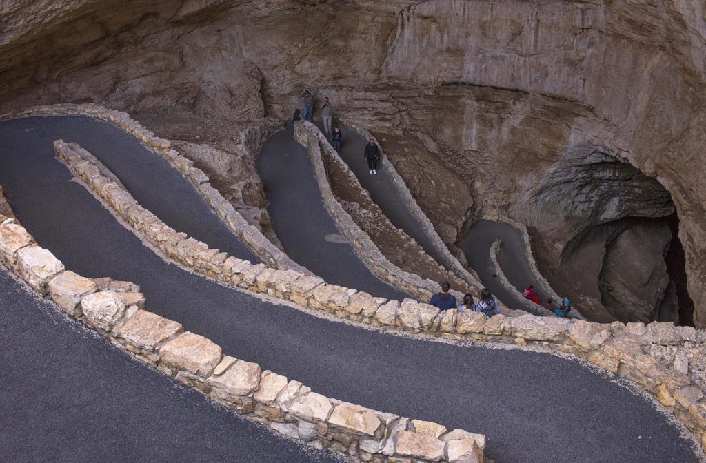 See that dark hole in the bottom right? That's where the bats fly out! As expected, it got darker and darker as we descended the switchbacks.